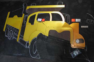 The completed front end shapes and most of the truck bed placed upon the tar paper template.