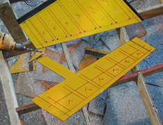 A rough shape is traced for the inner sections and some holes are drilled near the corners of the inner shapes