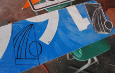 One of the coveted rare blue signs with the background of the PennDOT logo traced out, ready to cut