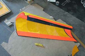 The finished snowplow blade whihc utilizes reflective vs no reflective signs to create visual depth