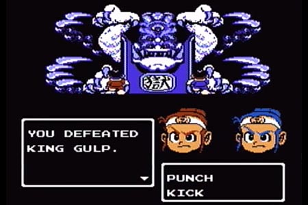 This shows the final battle with King Gulp at the end of little ninja brothers on Hard Mode.  King Gulp, in a blue frozen pallet, is shown with Jack and Ryu in the foreground.  After landing the final kick the battle has ending with the message, "You Defeated King Gulp" displayed.